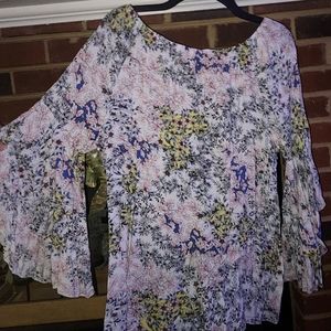 Ladies floral oversized blouse with angel sleeves towards bottom